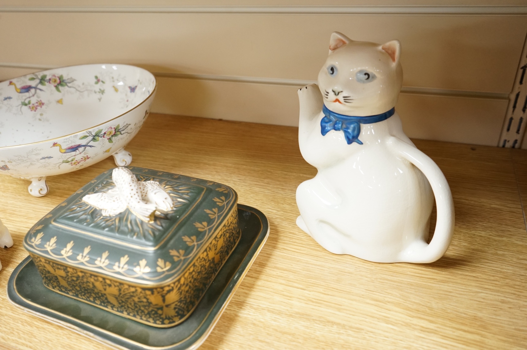 A collection of porcelain and pottery to include commemorative china, a leaf dish and group of wade figures, largest 29cm in diameter